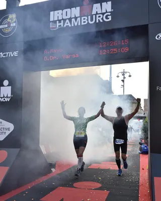 Arthur Mayo crossing the IRONMAN Hamburg finish line, 2019